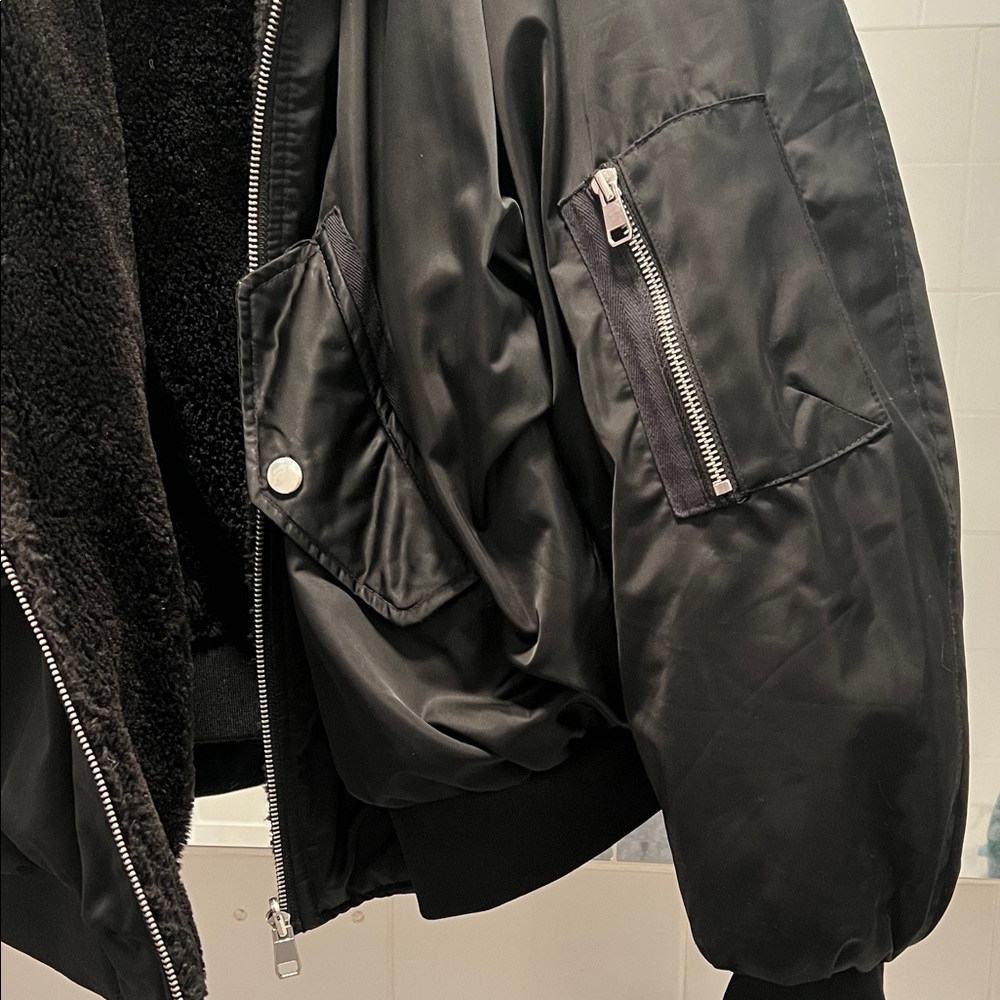 Unisex Oversized and Reversible Black Bomber Jacket with Faux Fur Lining - Picture 2 of 5
